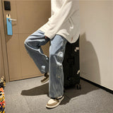 Xituodai Men's baggy jeans, a tousled waist, classic solid color, buttons and wireleg pants, men buckle pants Korean fashion