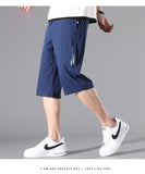 Xituodai Summer New Casual Sports Shorts Cropped Pants Trend Loose Fashion Cropped Pants Men's Over The Knee Versatile Slim Men's Pants